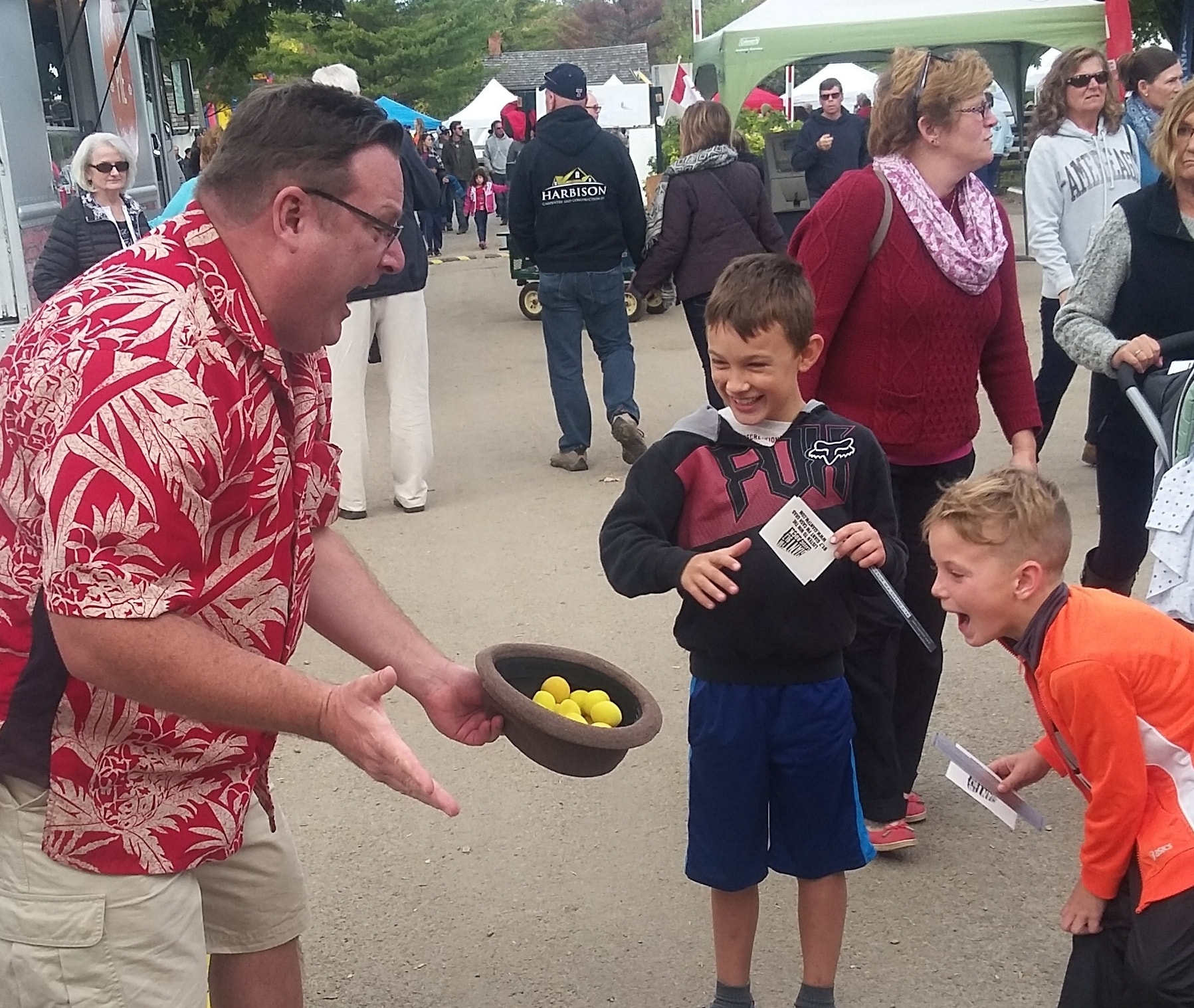 Scoop McCoy performing magic at Balls Falls Thanksgiving Festival